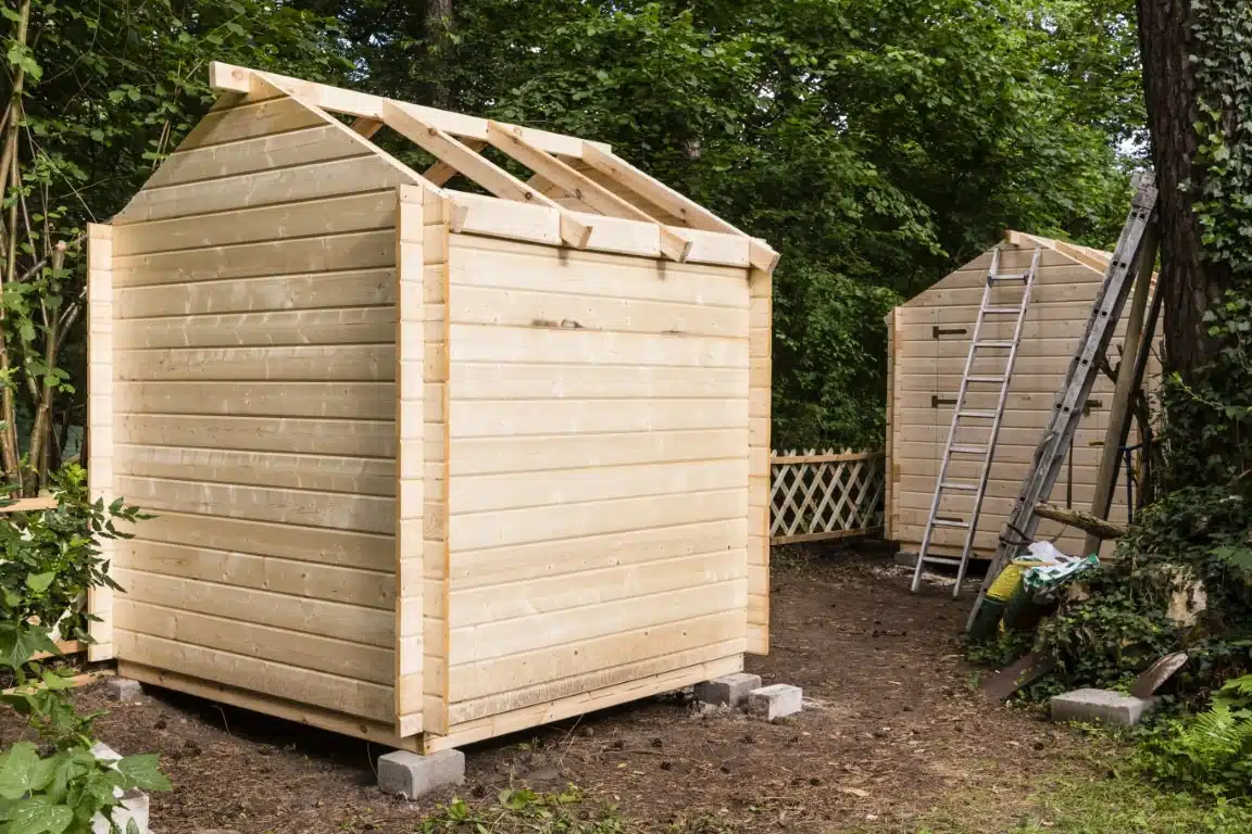 Étapes clés pour construire un abri de jardin en dur